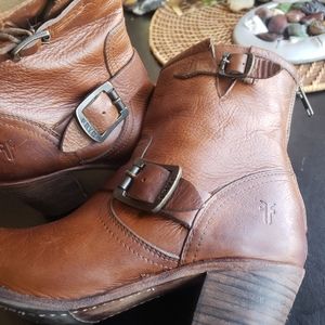 Frye boots with double buckles.